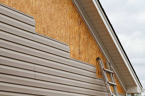 Professional Vinyl Siding technician working in Cherry Tree, PA